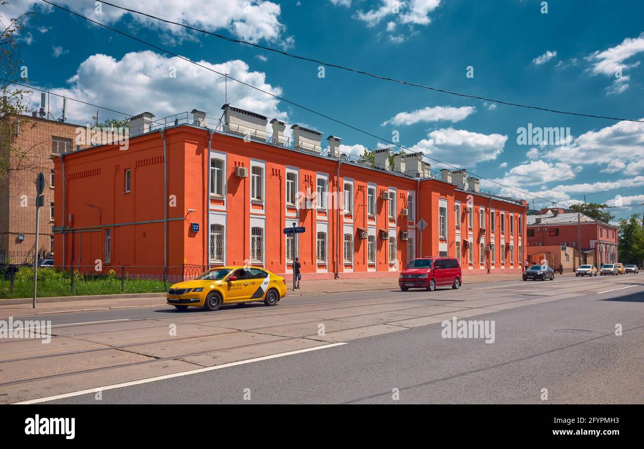 Colorful two story residential building on Kalanchevskaya Street, built in 1914: Moscow, Russia - May 26, 2021 Stock Photo