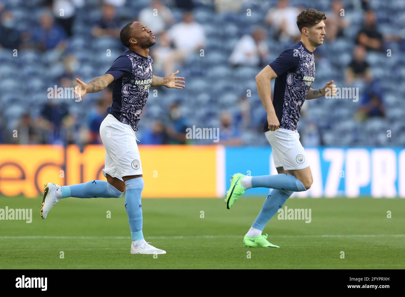 PORTO, PORTUGAL - MAY 29: Raheem Sterling [left] and John Stones [right] of Manchester City before the UEFA Champions League Final between Manchester City and Chelsea FC at Estadio do Dragao on May 29, 2021 in Porto, Portugal. (Photo by MB Media) Stock Photo