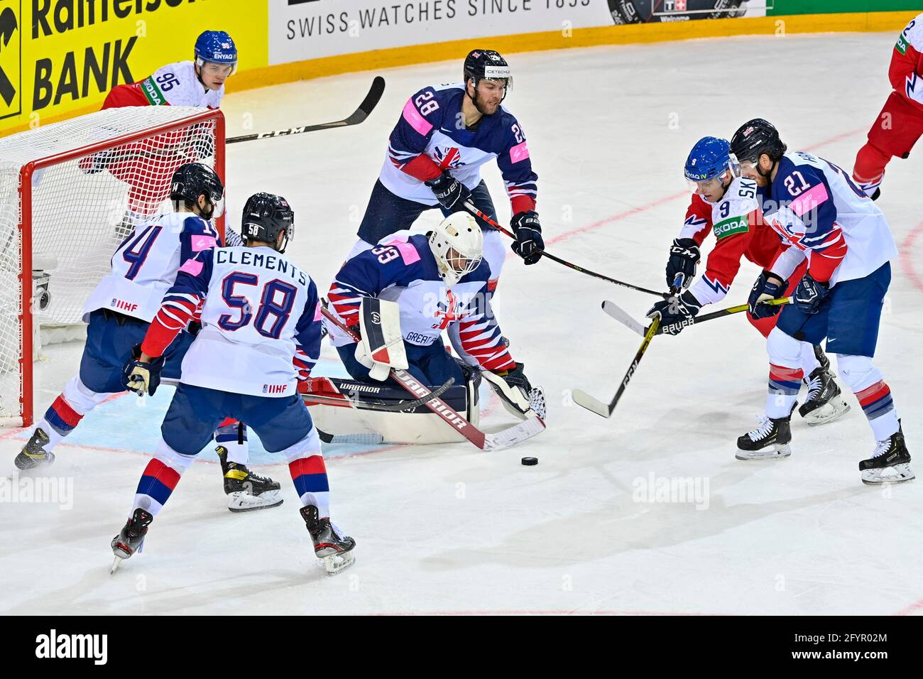 Riga, Latvia. 29th May, 2021. From left Matej Blumel (CZE), Liam Kirk (GB), David Clements (GB), Ben Bowns (GB), Ben O'Connor (GB), David Sklenicka (CZE), Mike Hammond (GB) in action during the 2021 IIHF Ice Hockey World Championship, Group A match Great Britain vs Czech Republic, played in Riga, Latvia, on May 29, 2021. Credit: Vit Simanek/CTK Photo/Alamy Live News Stock Photo