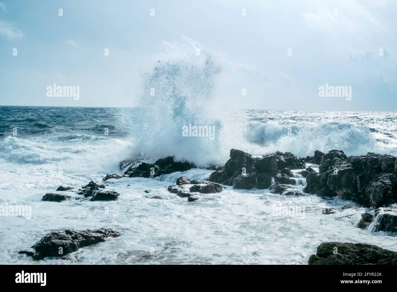 Powerful blow of the sea wave Stock Photo