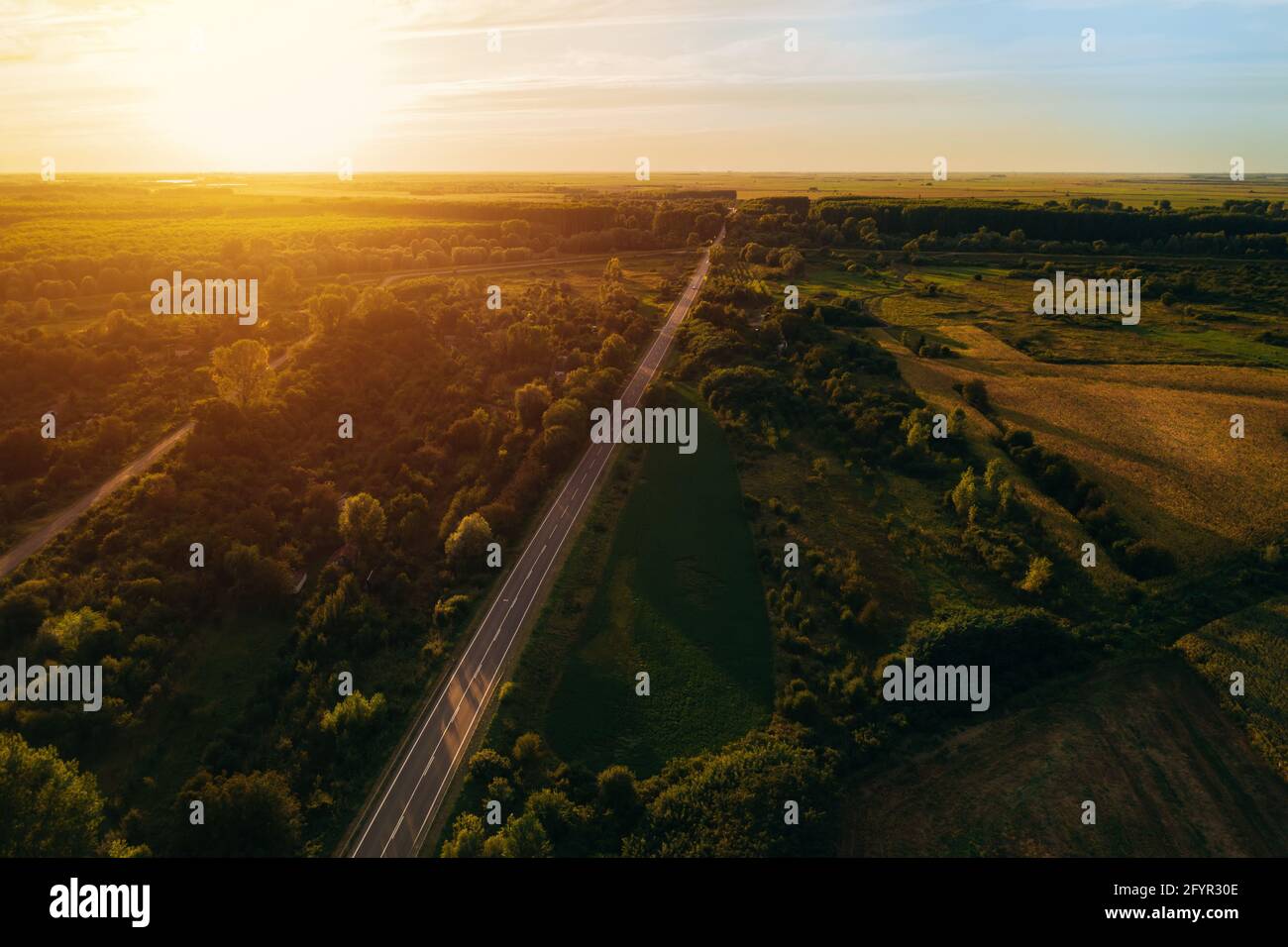 Beautiful aerial view of scenic countryside in summer sunset from drone pov, Banat region in Vojvodina, Serbia Stock Photo