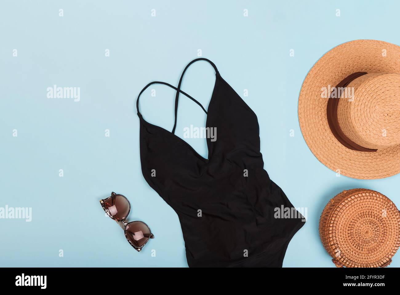 Black Swimming suit with sunglasses and hat Stock Photo