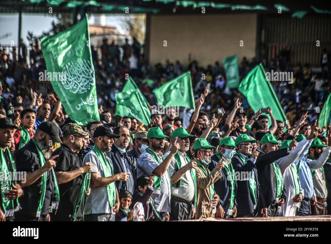 Gaza, Palestine. 29th May, 2021. Palestinian supporters of Hamas chanting, during an anti-Israel military parade by Izz al-Din al-Qassam Brigades in Rafah, in the southern Gaza Strip. Credit: SOPA Images Limited/Alamy Live News Stock Photo