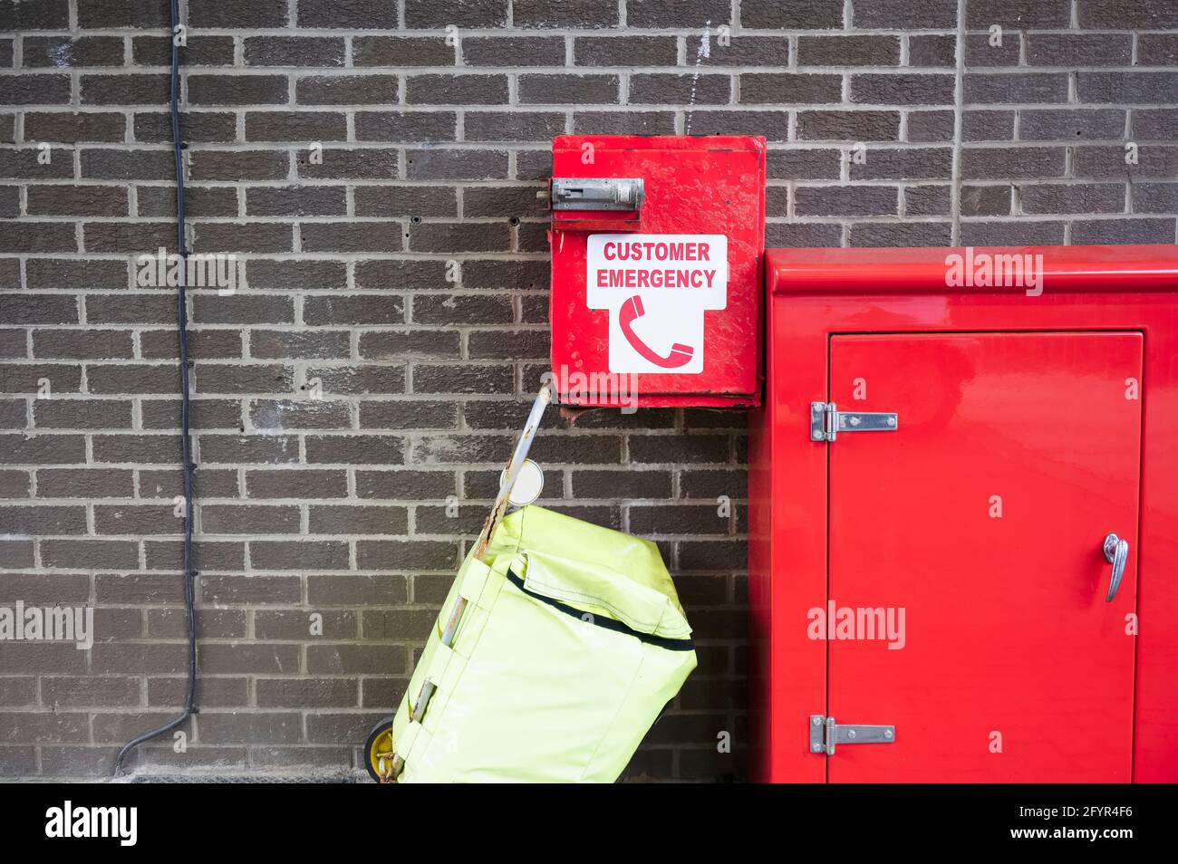 Help assistance emergency free telephone phone box for safety and protection of public people Stock Photo