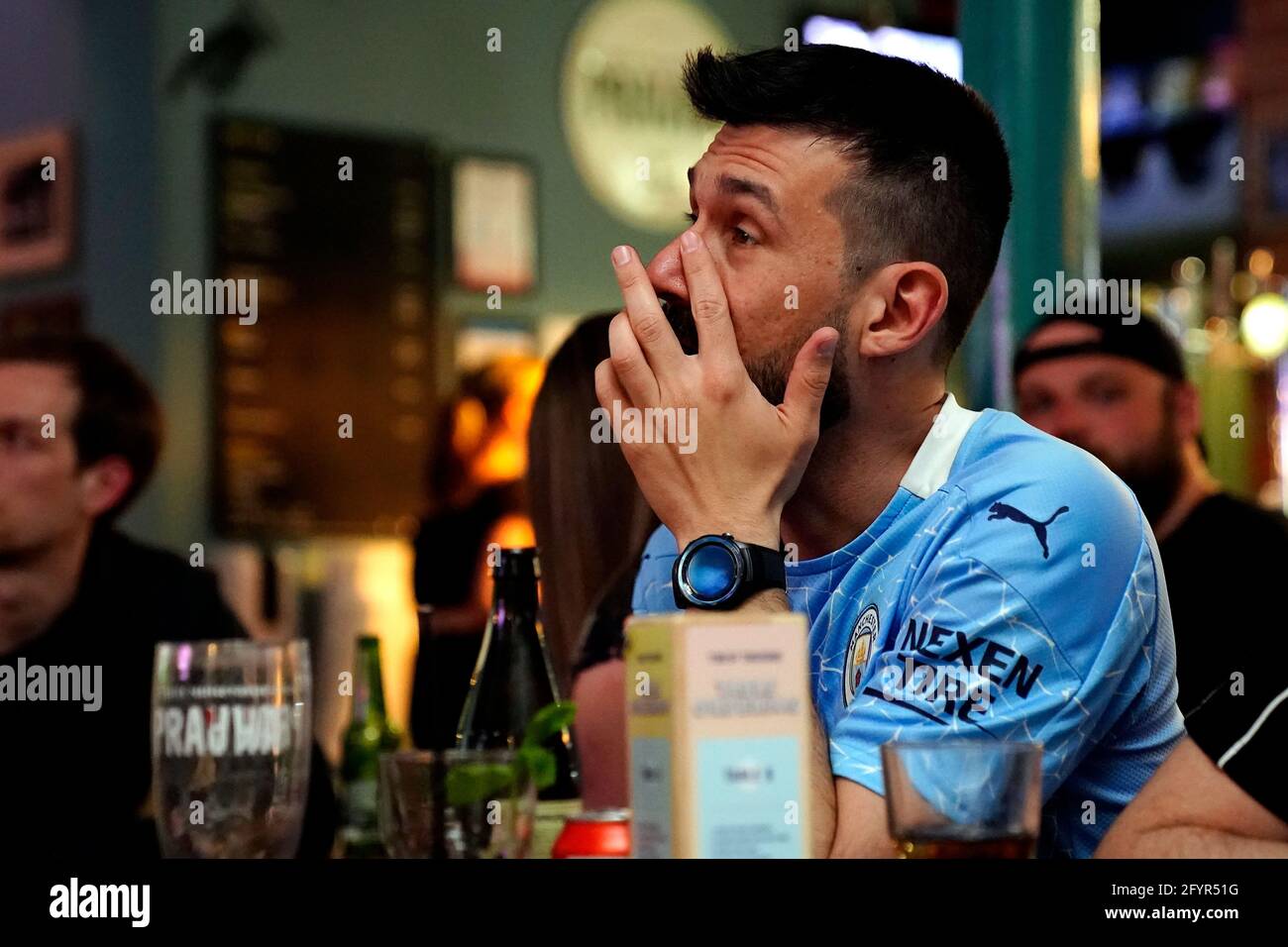 Manchester City fan reacts in the Tib Street Tavern during the UEFA Champions League Final between Manchester City and Chelsea. Picture date: Saturday May 29, 2021. Stock Photo