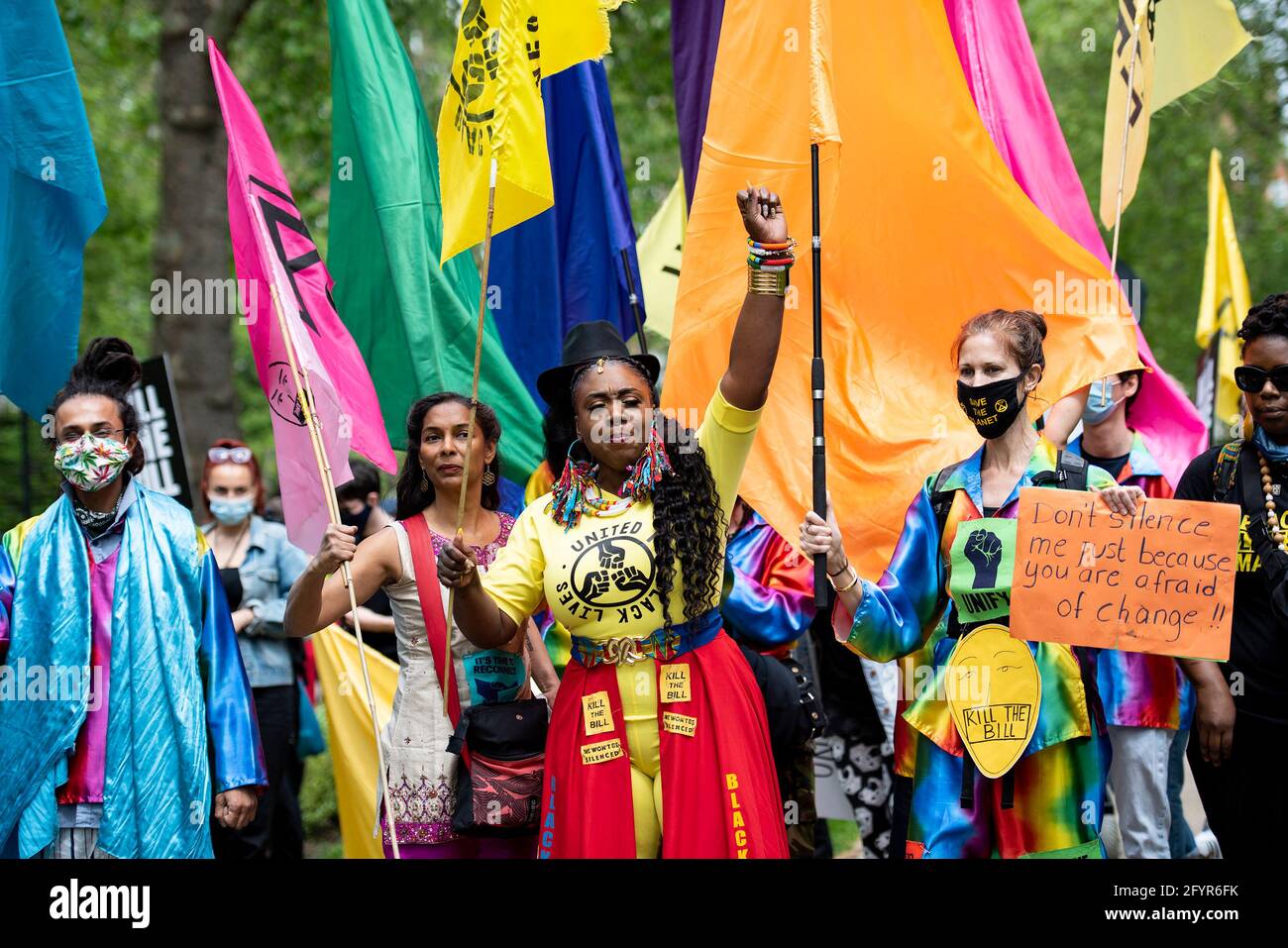 London, UK. 29th May, 2021. Protesters hold colorful flags during the Kill the Bill IV Protest in London to condemn a proposed bill that will give police and the Home Secretary increased power to stop protests.The rallies are being held against the Police, Crime, Sentencing and Courts Bill. Credit: SOPA Images Limited/Alamy Live News Stock Photo