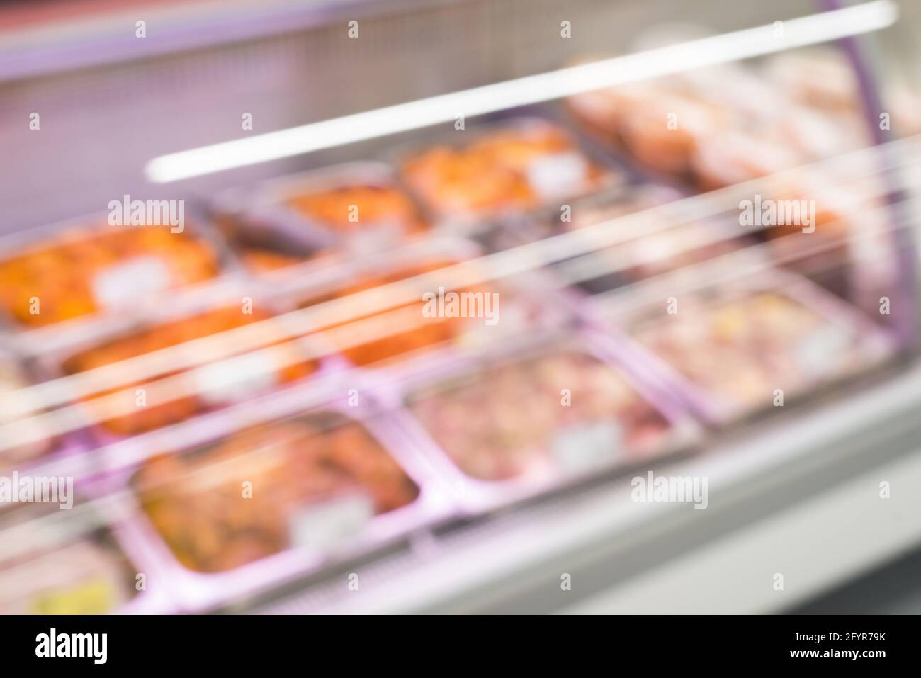 defocused meat refrigerated display case Stock Photo