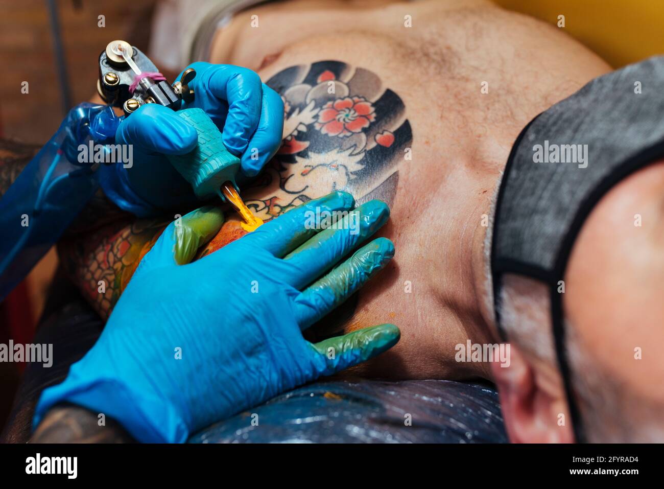 Tattooing an arm hi-res stock photography and images - Alamy