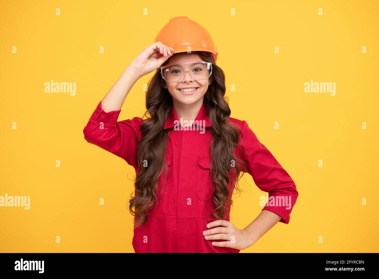 best service. kid future engineer on yellow background. safety glasses for repairing. labor day. Stock Photo
