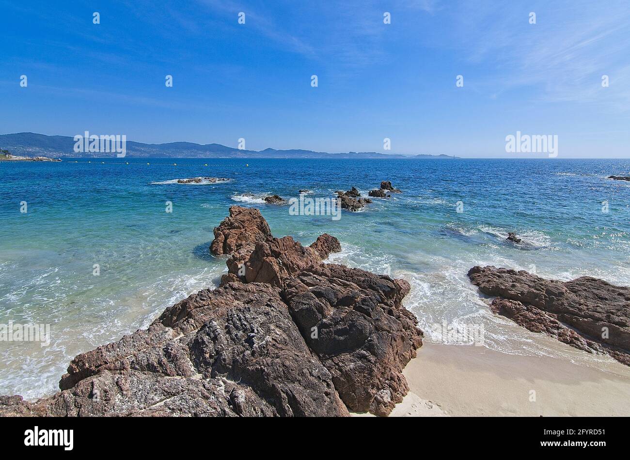 Sunny day at the beach. Vacation scene Stock Photo - Alamy