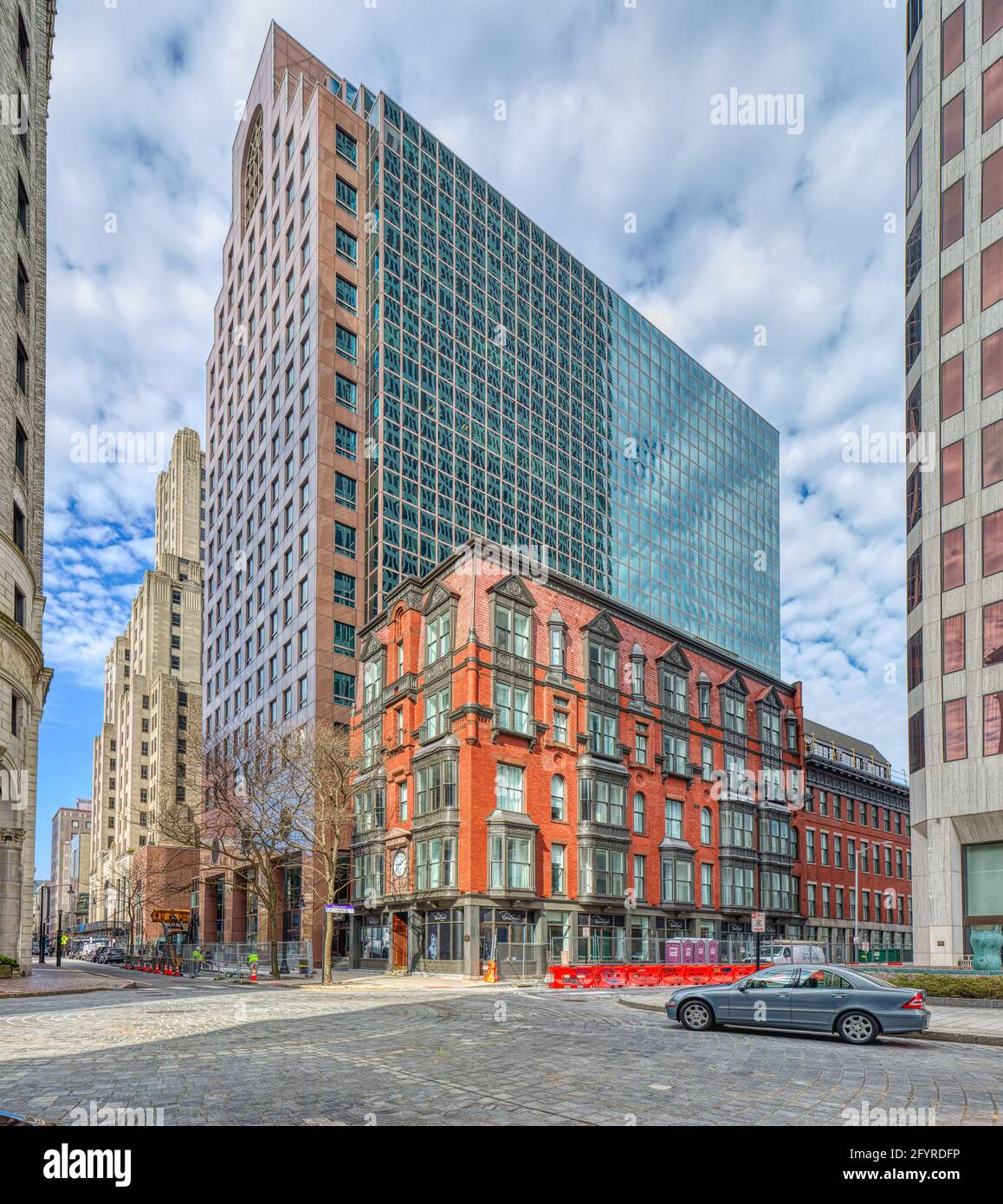 Looking up Westminster Street: (right to left) Exchange Building (Beatrice Hotel), Fleet Center, Industrial National Bank Building (aka Superman Buil Stock Photo