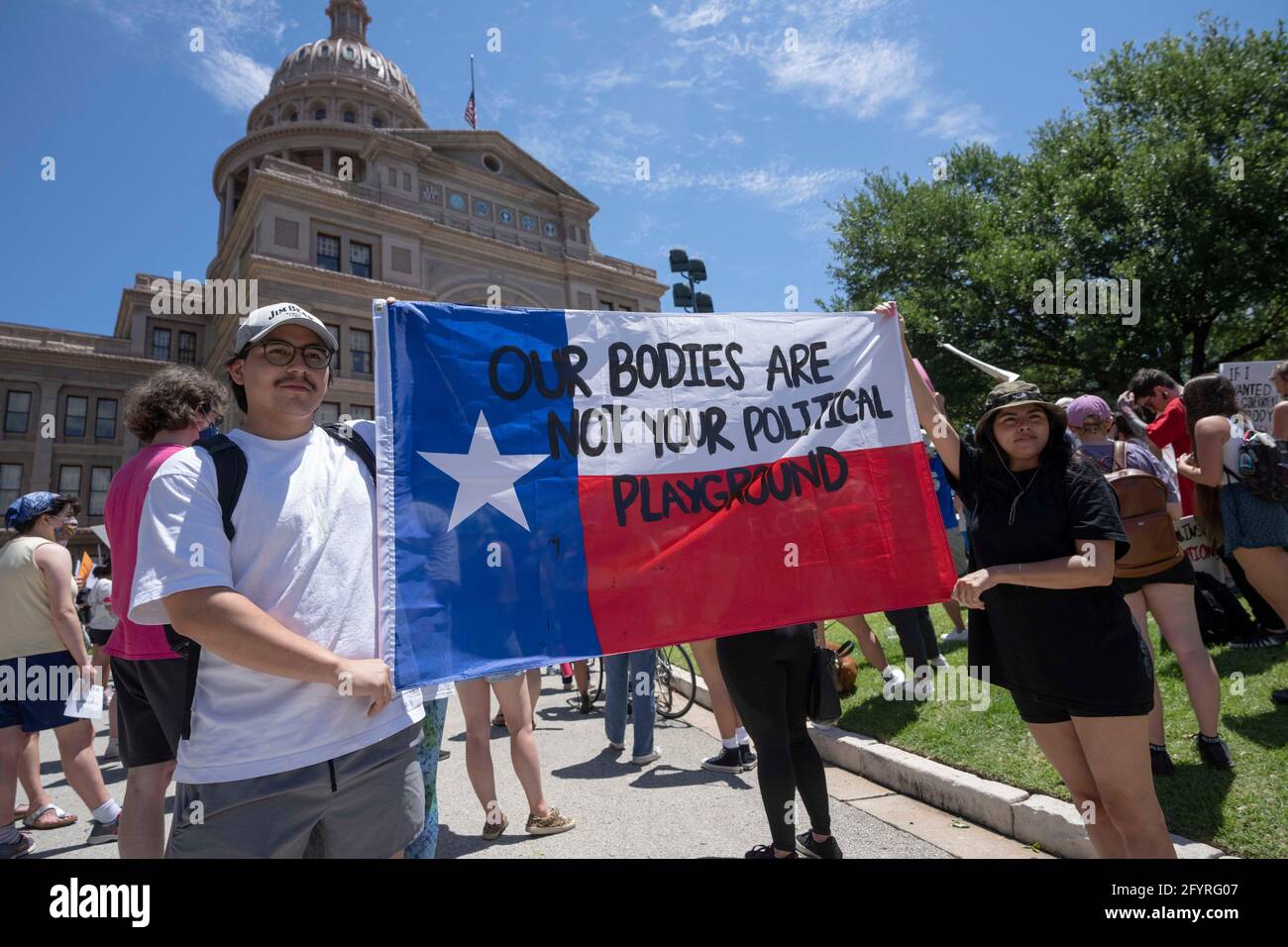 Austin, Texas, USA. 29th May, 2021. Several hundred Texans rally at the State Capitol in Austin protesting recently enacted legislation by Governor Greg Abbott that severely restrictions access to legal abortions. The law outlaws abortion procedures after detection of a heartbeat, generally six weeks after conception, or about the time a woman is aware of a pregnancy. Credit: Bob Daemmrich/Alamy Live News Stock Photo