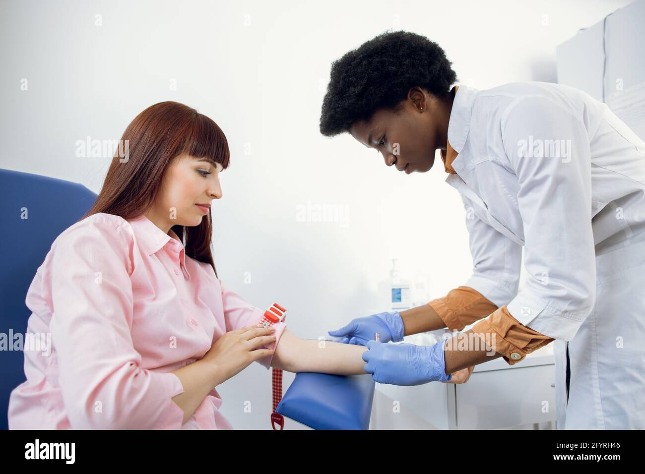 Preparation For Blood Test Beautiful Young African Woman Doctor In preparation-for-blood-test-beautiful-young-african-woman-doctor-in