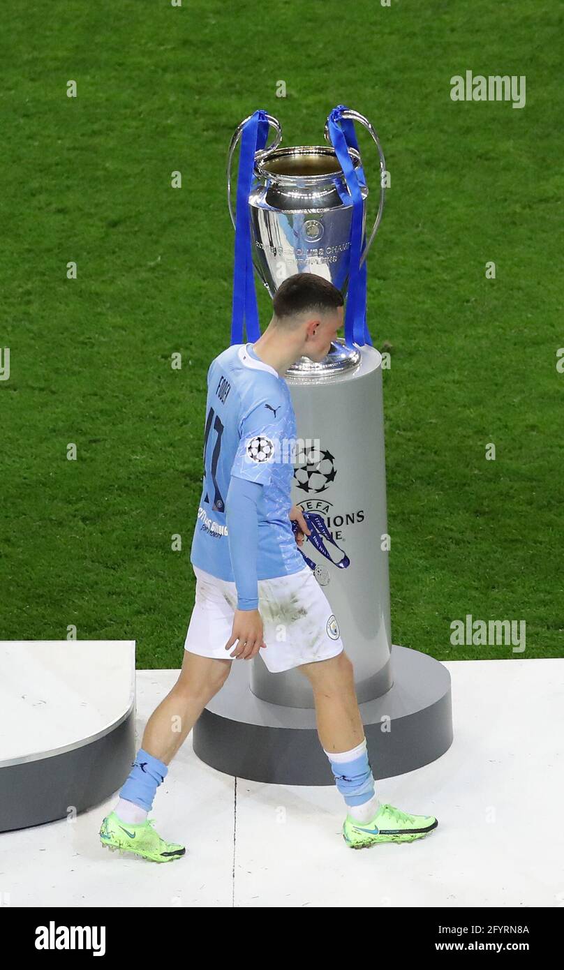 Porto, Portugal, 29th May 2021. Phil Foden of Manchester City walks past the trophy losers medal in hand during the UEFA Champions League match at the Estadio do Dragao, Porto. Picture credit should read: David Klein / Sportimage Stock Photo