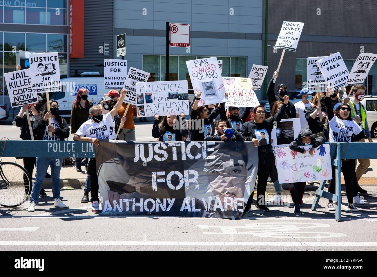 Family and supporters of Anthony Alvarez protest police outside of the 16th  District precinct of the Chicago Police Department in the Jefferson Park  neighborhood in Chicago, Illinois on May 29, 2021. Anthony