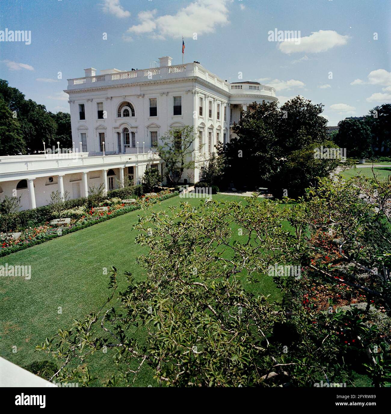 The White House Rose Garden, August 24, 1962. The White House Rose Garden  is a garden bordering the Oval Office and the West Wing of the White House  in Washington, D.C., United, image size:1300x1375