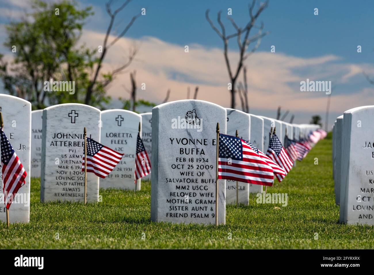 Holly, Michigan, USA. 29th May, 2021. American flags were placed on the graves of veterans for Memorial Day at Great Lakes National Cemetery. Credit: Jim West/Alamy Live News Stock Photo