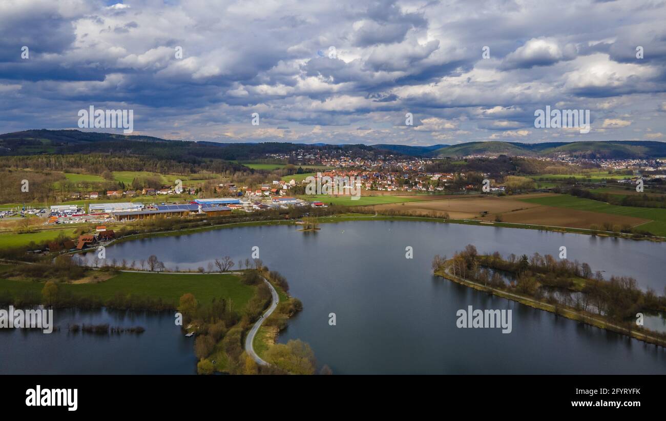 A beautiful landscape with a lake under cloudy sky Stock Photo - Alamy