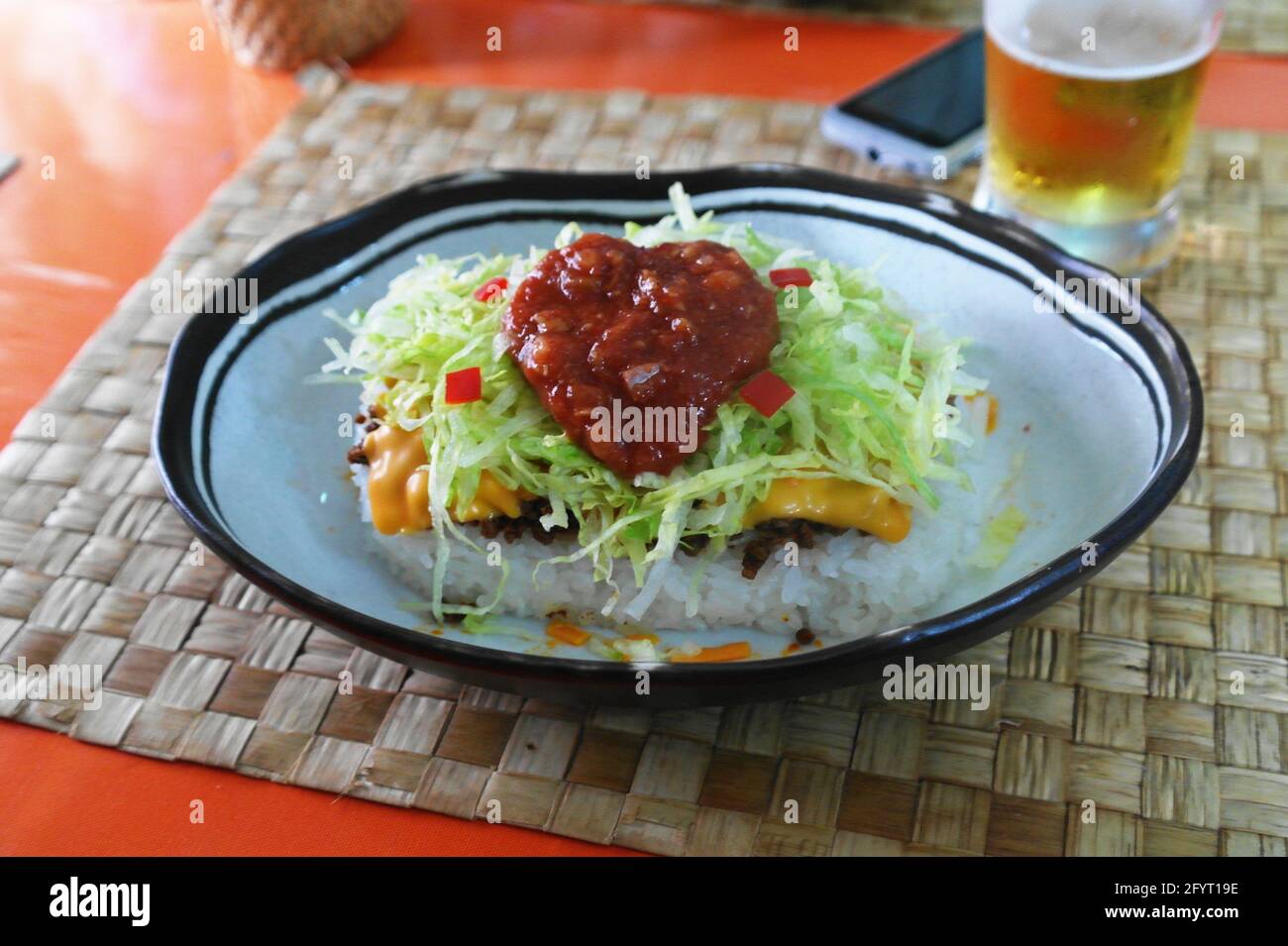 Taco rice, blend of Texmex and Okinawan cuisine Stock Photo