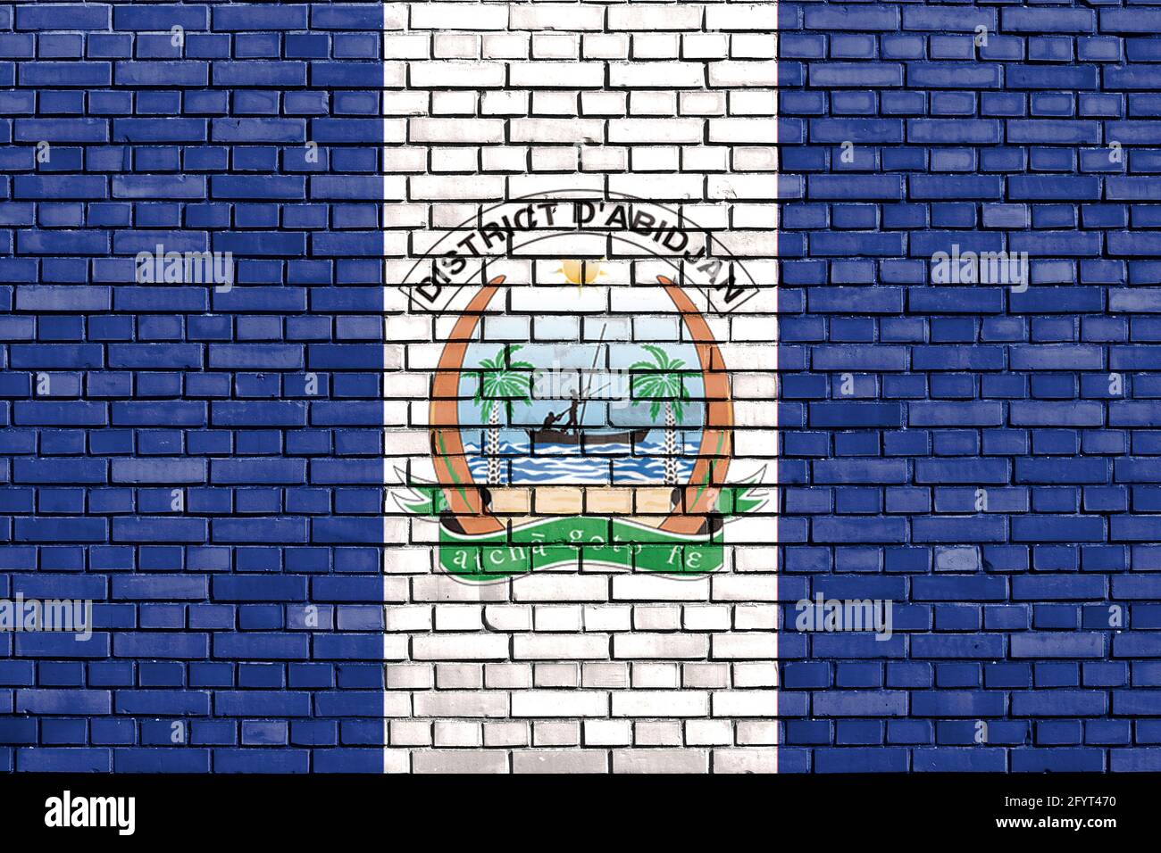 flag of Abidjan, Ivory Coast painted on brick wall Stock Photo