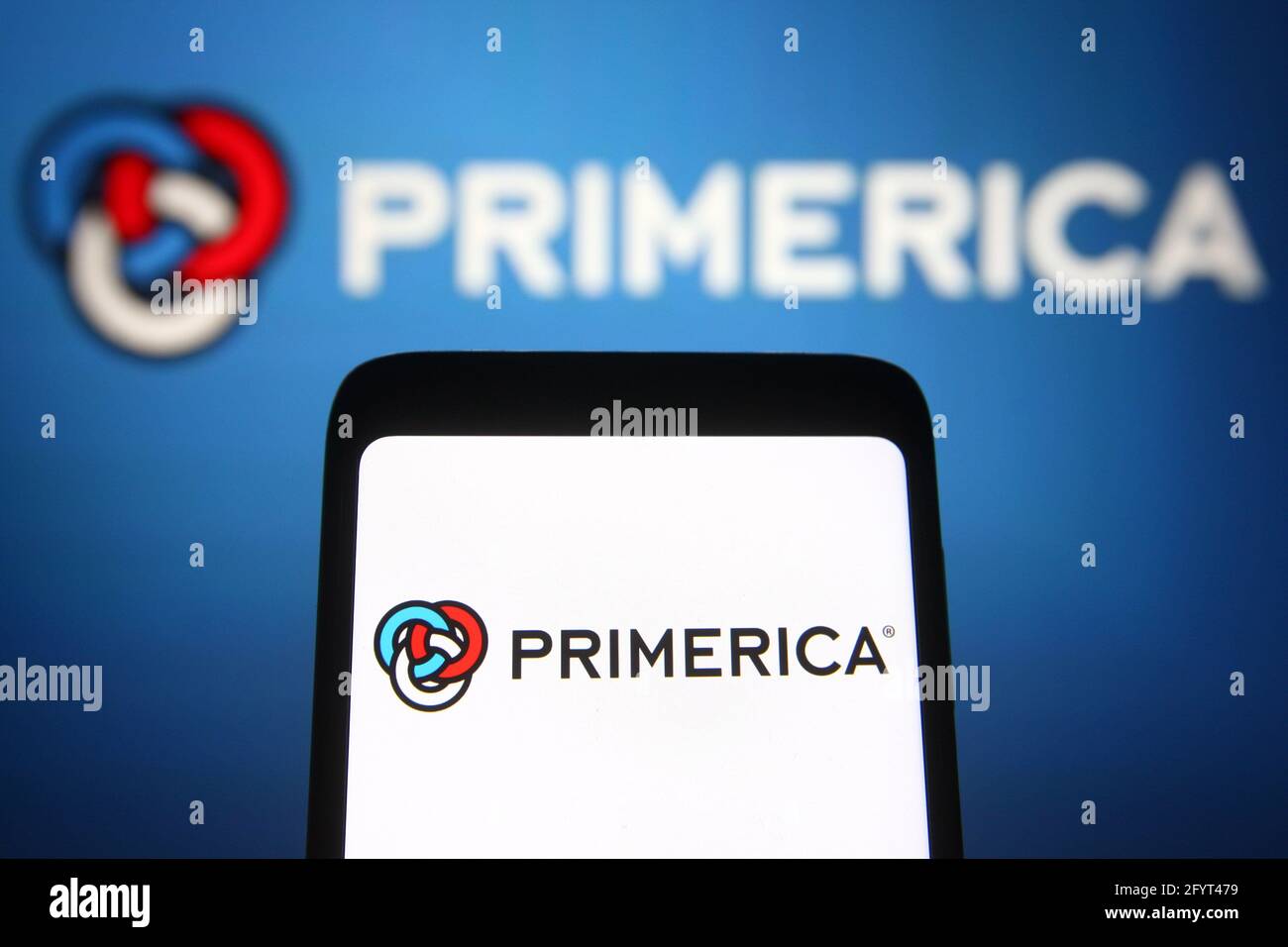 In this photo illustration, Primerica logo seen on a smartphone and a