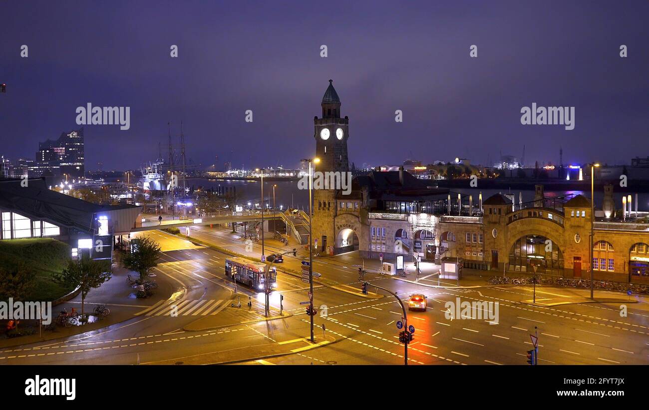 Famous St Pauli Landungsbruecken at the port of Hamburg - amazing evening view Stock Photo