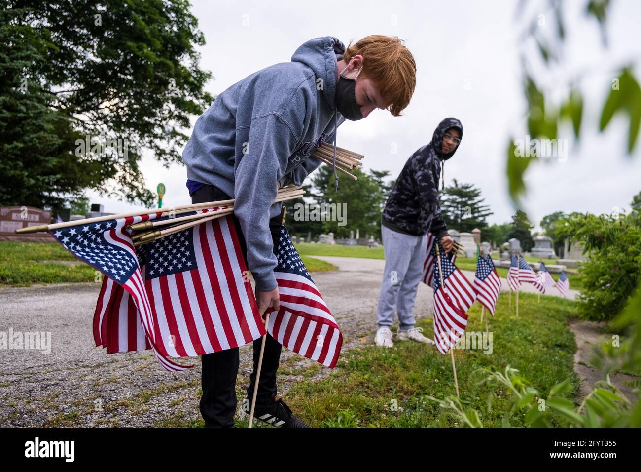 American flags are placed at Rose Hill Cemetery for Memorial Day Saturday. Memorial Day, which