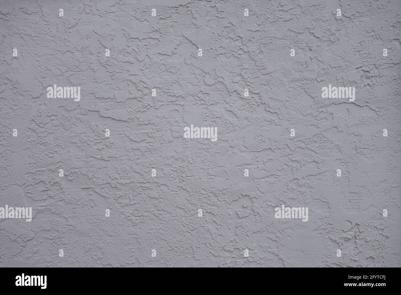 Textured stucco grey wall surface background Stock Photo