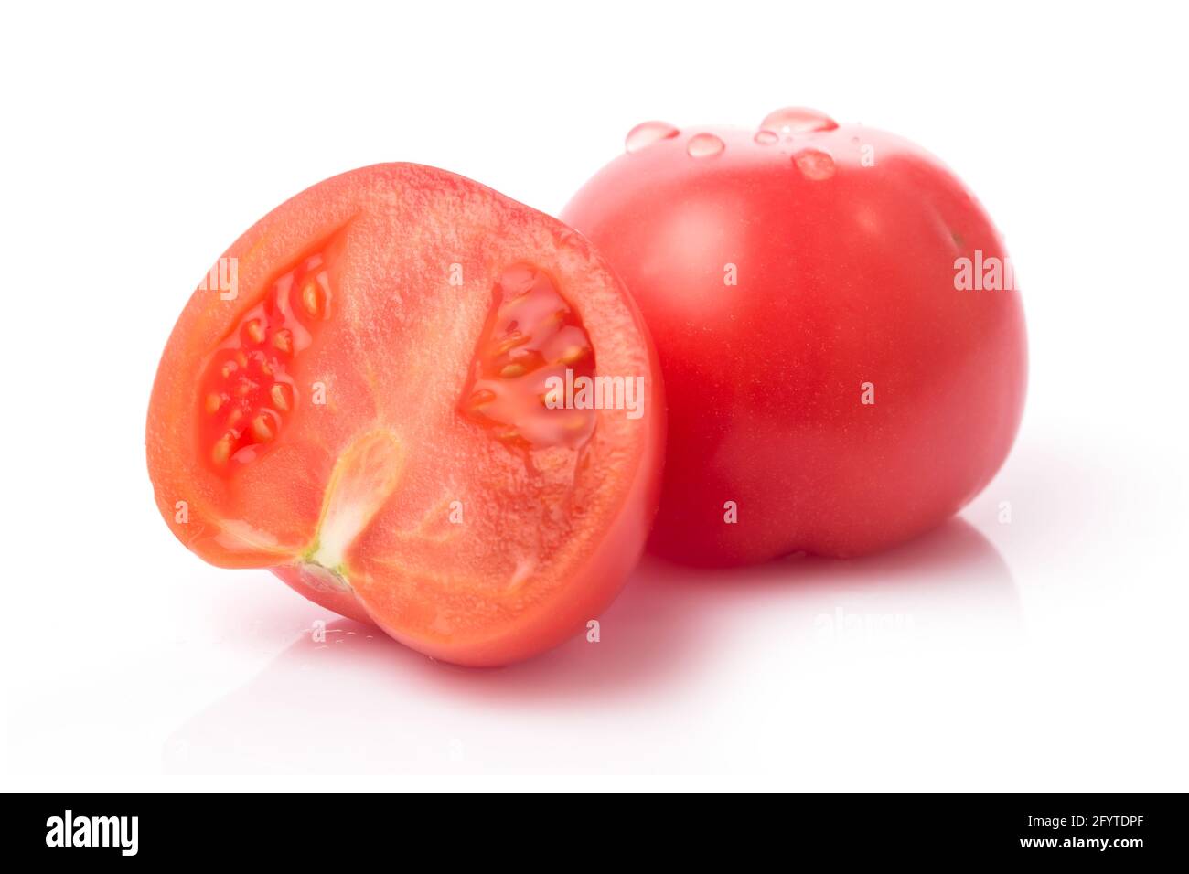 one fresh red tomato isolated on white Stock Photo - Alamy