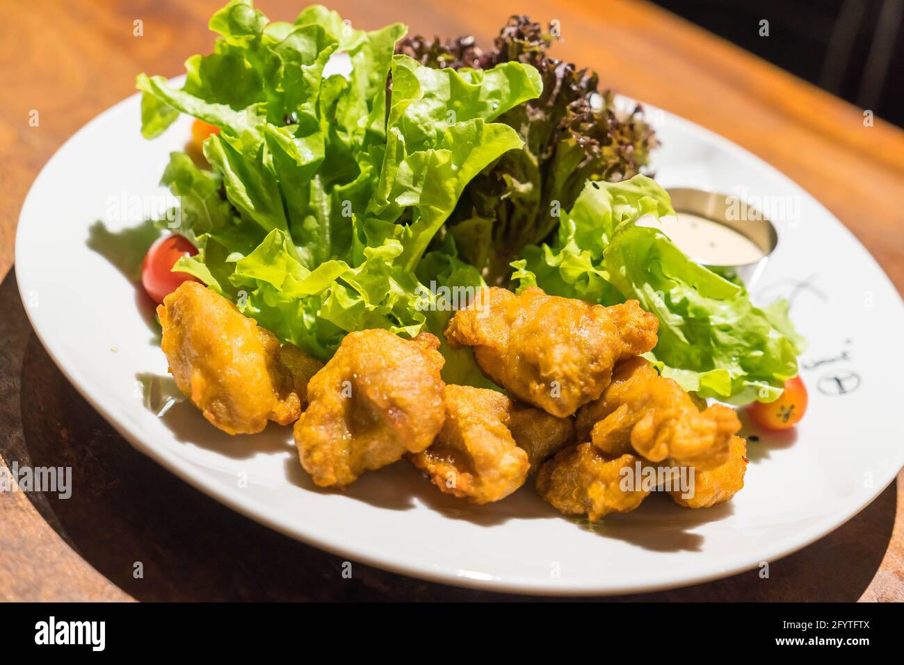 Deep fried chicken (Karaage) with salad Stock Photo Alamy