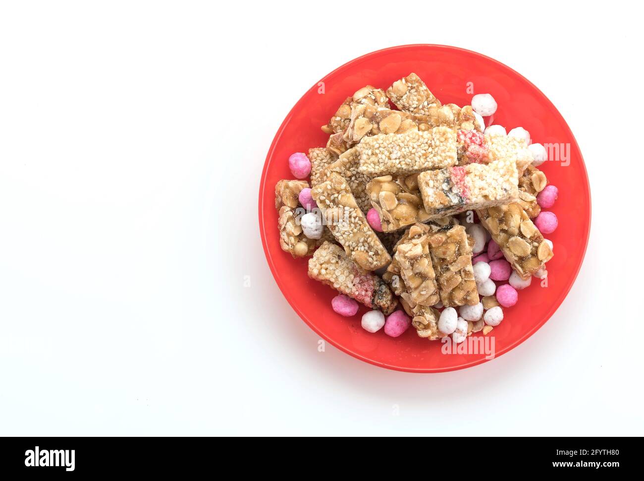 chinese traditional snack peanuts and sesame candy bars on white