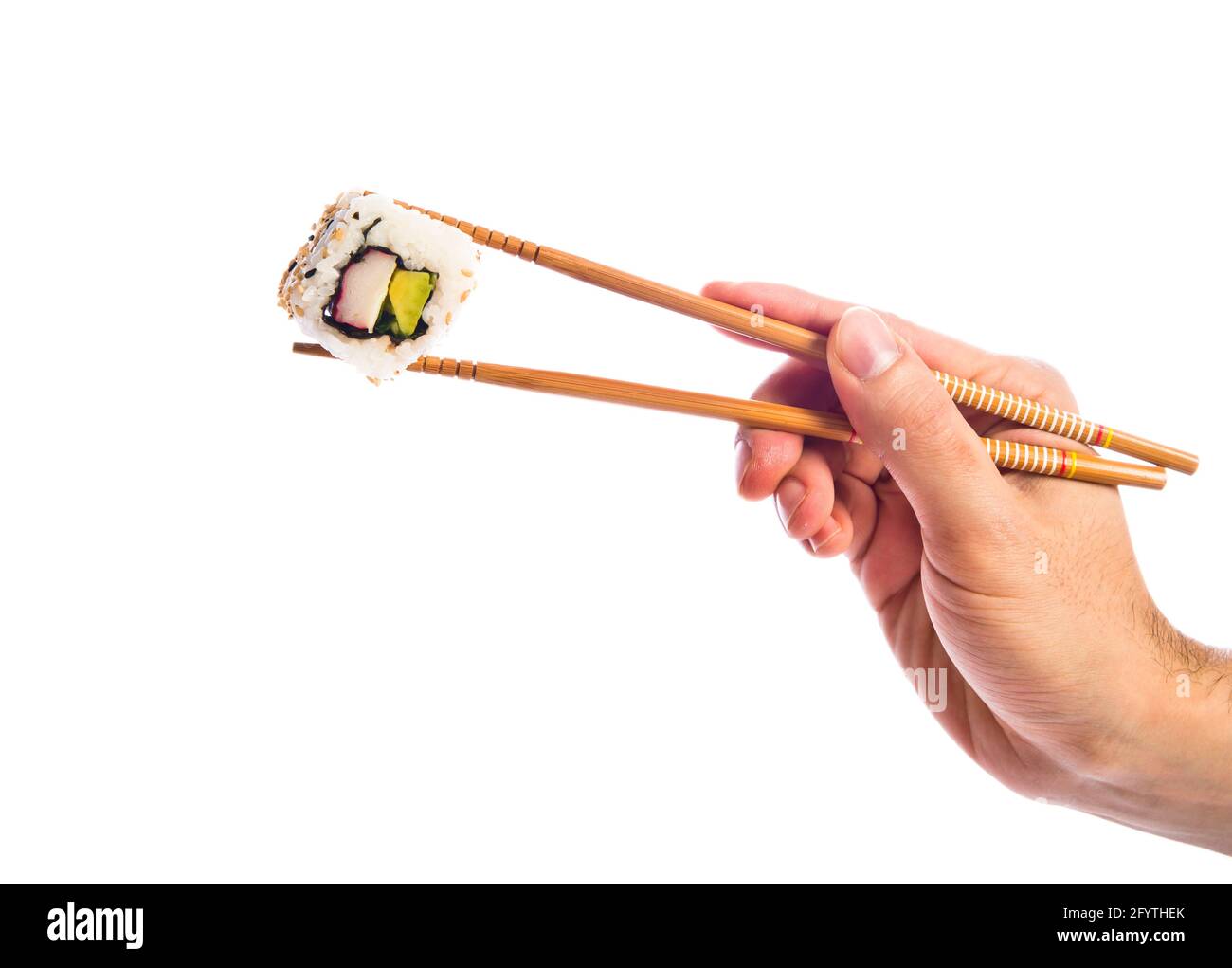 hand holding sushi with chopsticks Stock Photo Alamy