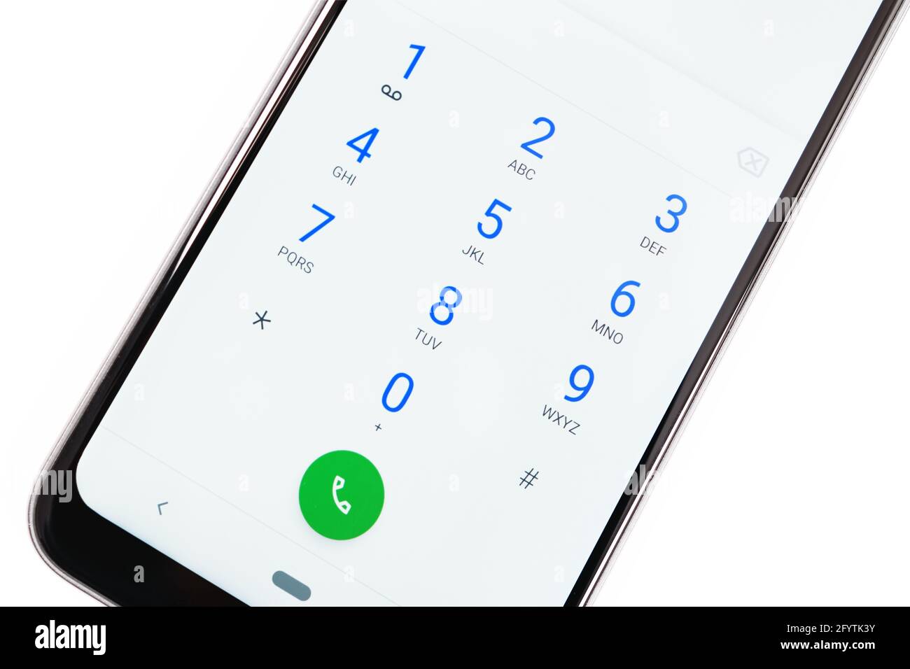 Modern smartphone screen with numbers dialing keypad in close-up on a white background Stock Photo