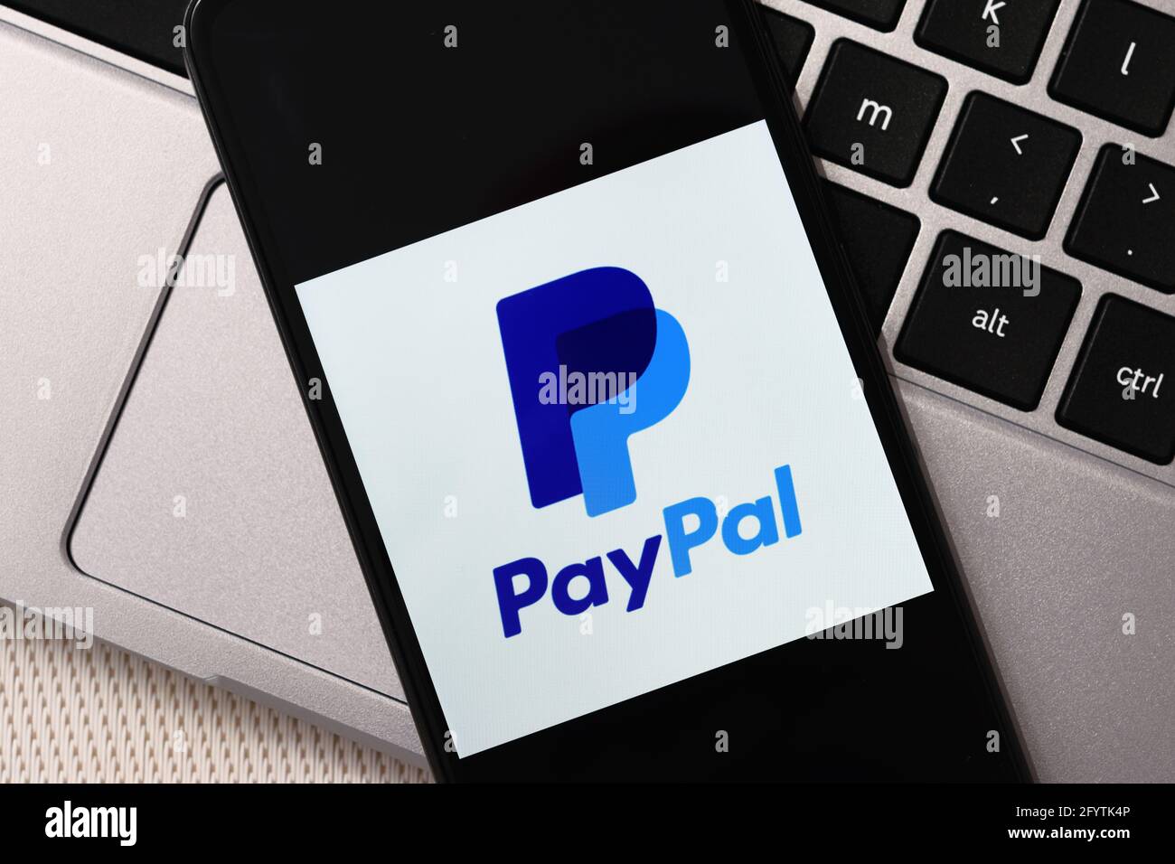 Krakow, Poland - October 16, 2020:  PayPal sign on the smartphone screen. PayPal is an online electronic finance payment system. Stock Photo