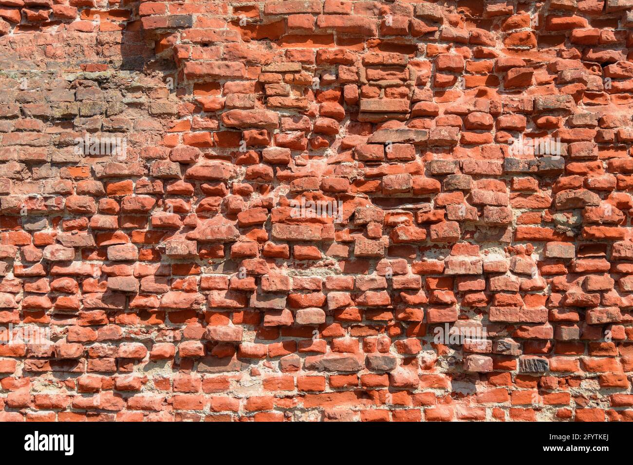 Full frame background of old broken red bricks wall (high details) Stock Photo