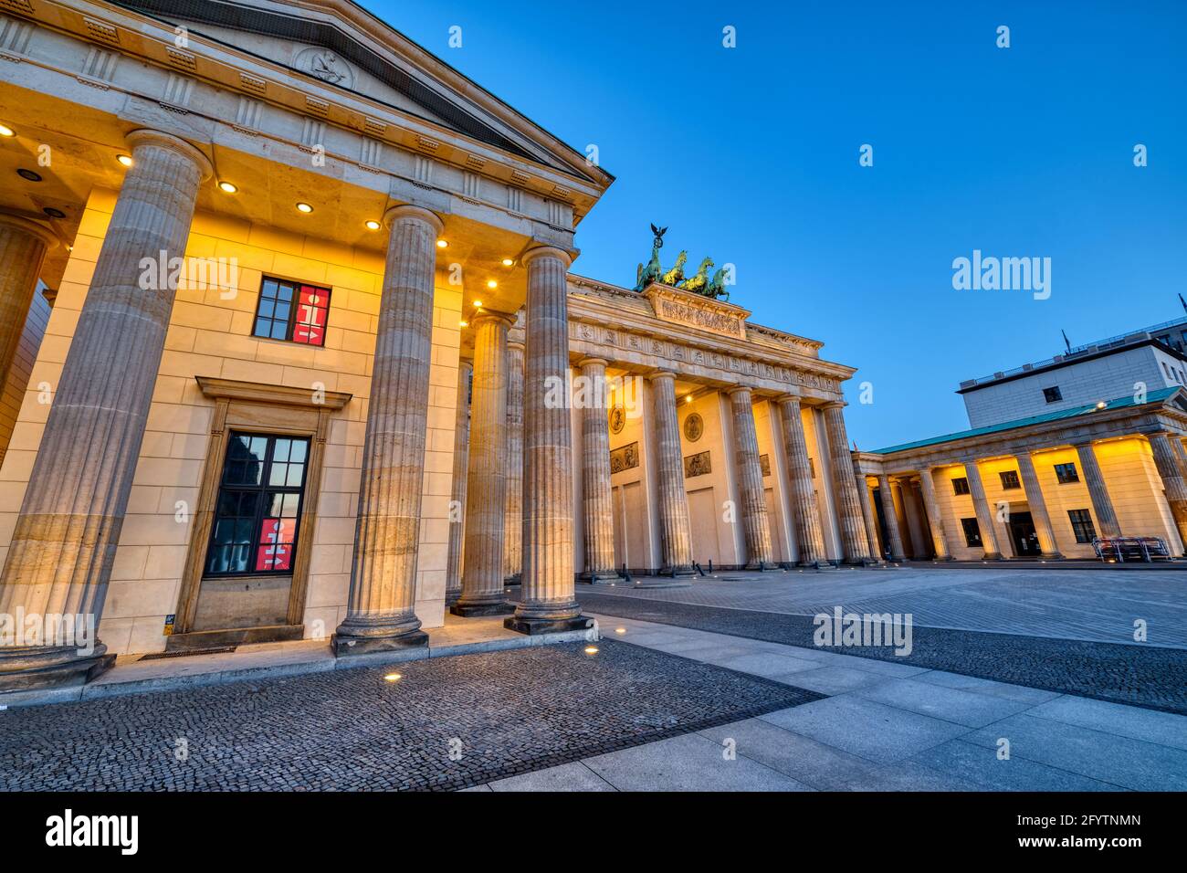 The famous Brandenburg Gate in Berlin at dawn with no people Stock Photo