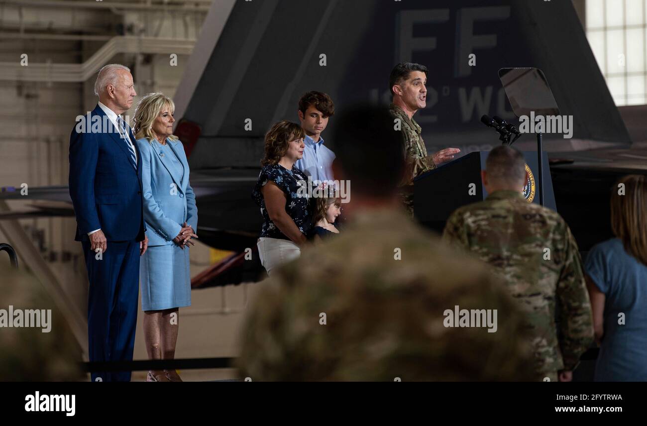 U.S. Air Force Col. Clint Ross introduces President Joe Biden and First Lady Jill Biden during a visit to Joint Base Langley-Eustis May 28, 2021 in Newport News, Virginia. Biden spoke on the importance of military sacrifice and thanked the members for their continued dedication to defending the nation. Stock Photo