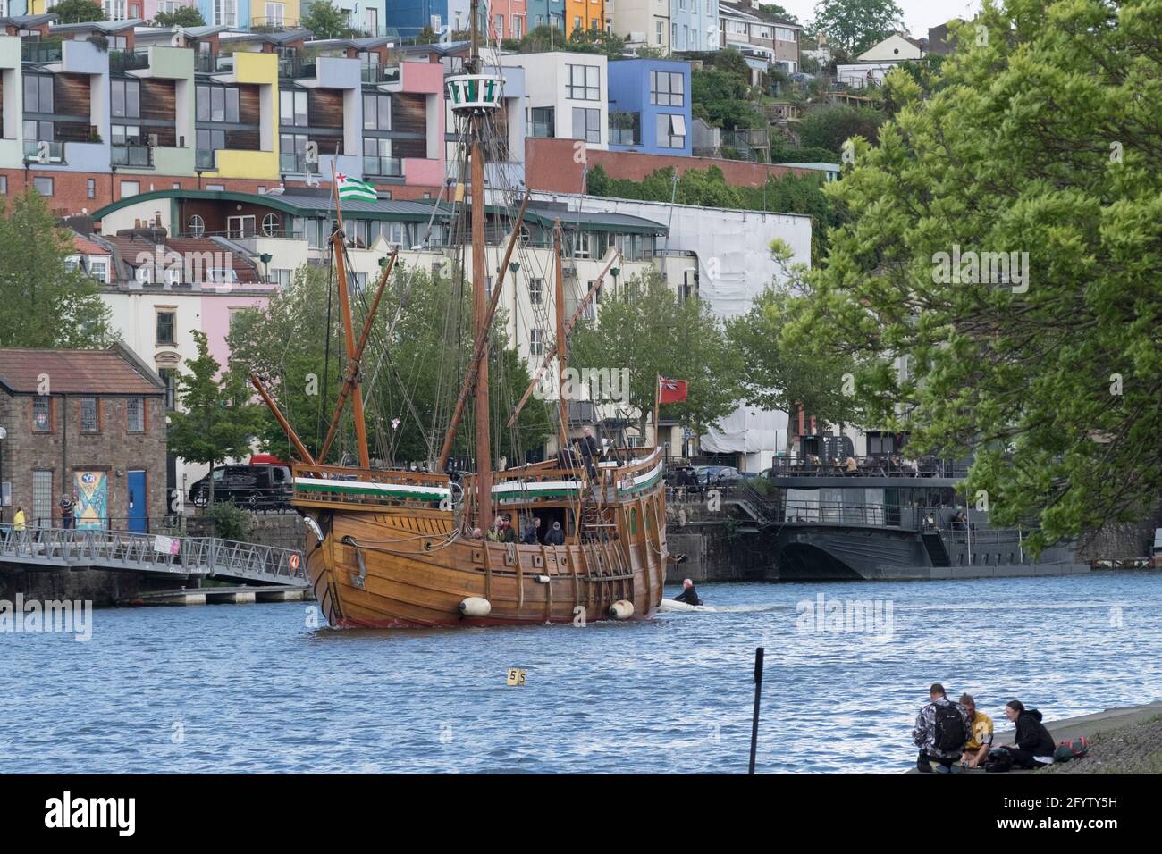 Sailing ship Matthew in Bristol harbour. colurful Bristol houses in background. Stock Photo