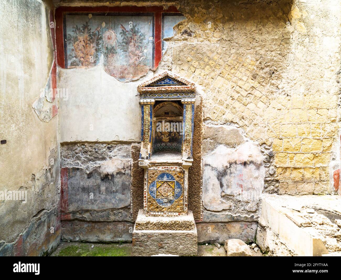 Mosaic lararium (shrine) - House of the Skeleton (Casa dello Scheletro) - Herculaneum ruins, Italy Stock Photo