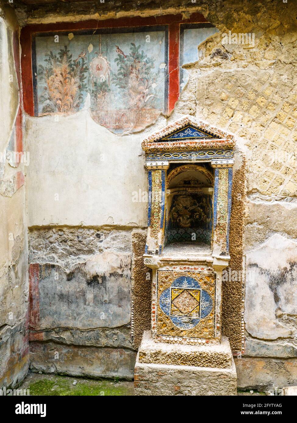 Mosaic lararium (shrine) - House of the Skeleton (Casa dello Scheletro) - Herculaneum ruins, Italy Stock Photo