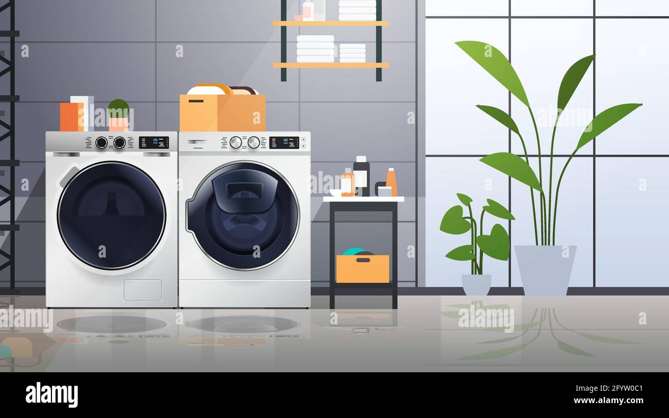 interior of laundry room with washing machines electric washers home appliance concept