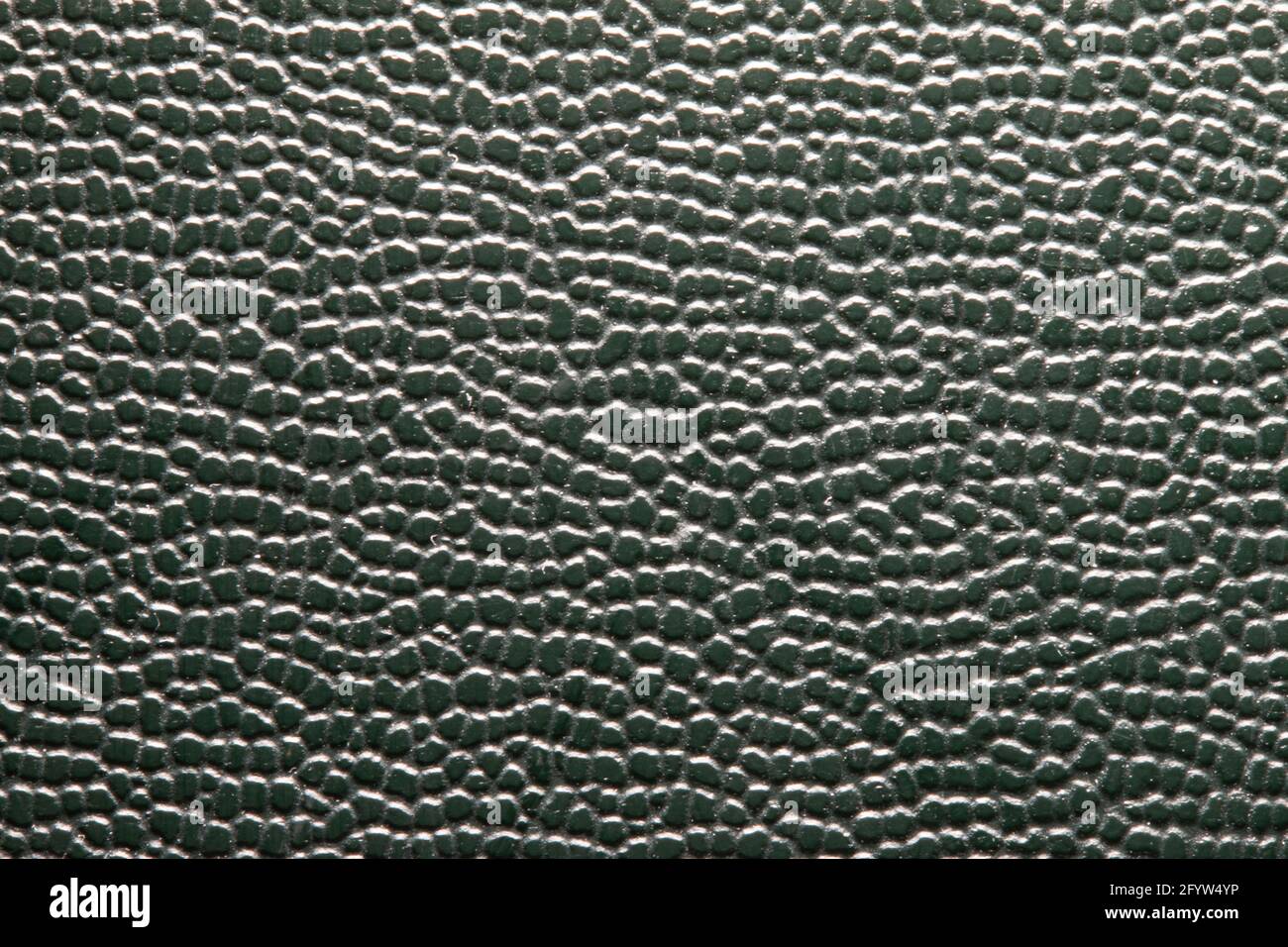 Dark green grained leather close-up Stock Photo