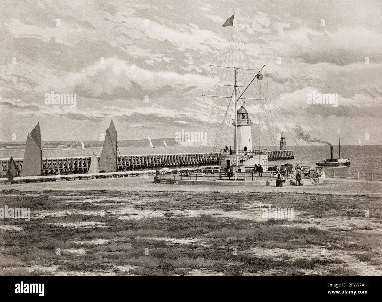 A late 19th century view of the Signal Station  beside the breakwater in Newhaven. Built before the days of Radio telegraphy, it communicated with shipping using flags. A channel ferry port in East Sussex in England, lying at the mouth of the River Ouse, it was officially recognised as 'The Port of Newhaven' in 1882. Stock Photo