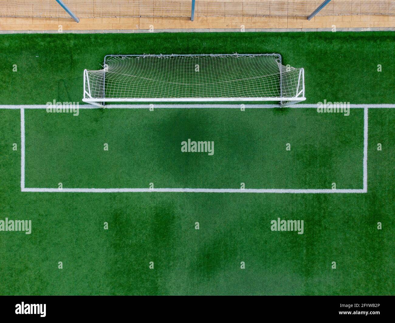 aerial view of goal on soccer pitch covered with artificial grass in Altea La Vella, Alicante, Spain Stock Photo