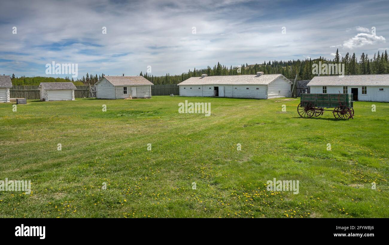 Maple Creek, Saskatchewan, Canada May 27, 2021 Log buildings and wagon at Fort Walsh National