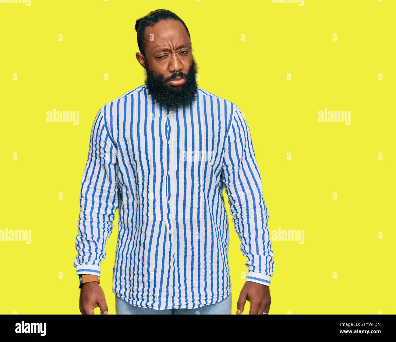 Young african american man wearing business shirt depressed and worry ...