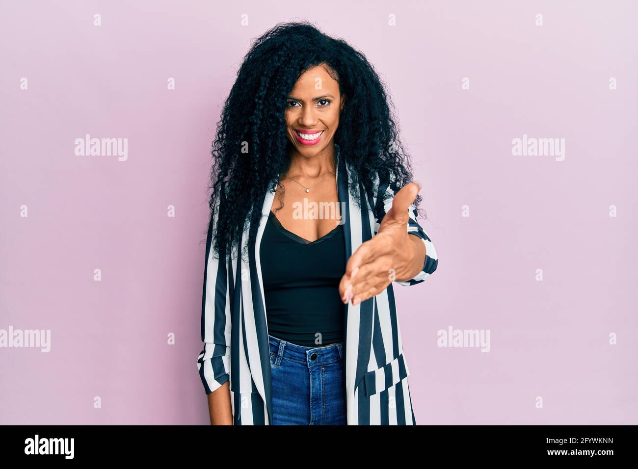 Middle age african american woman wearing casual clothes smiling ...