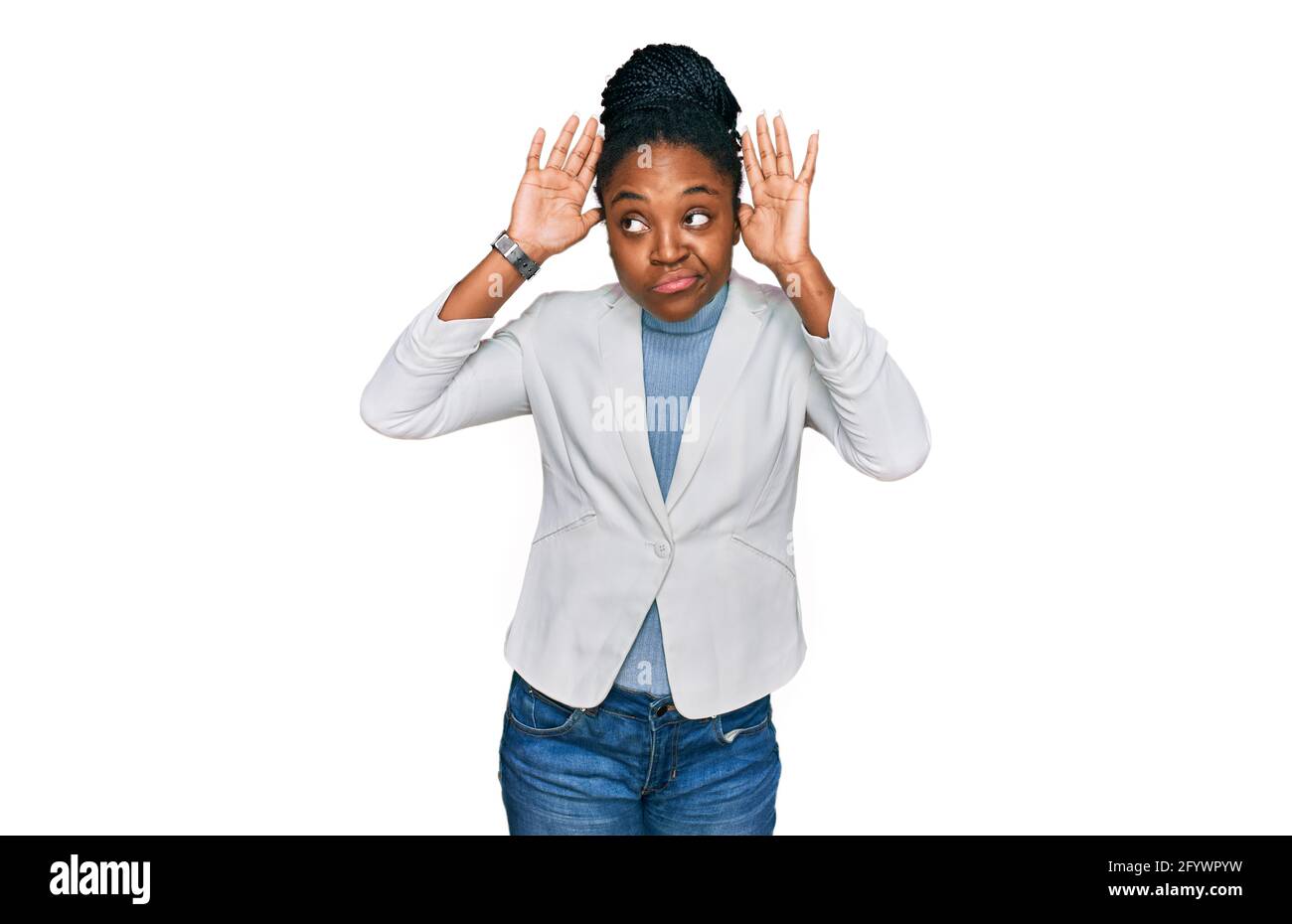 Young african american woman wearing business clothes doing bunny ears ...