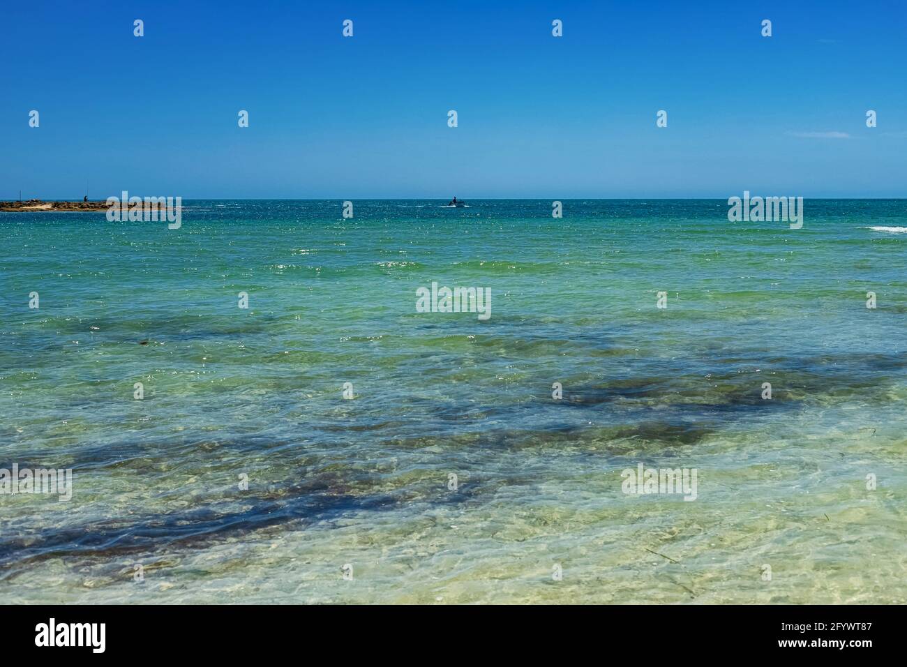 Seascape. Wonderful view of the lagoon, seashore, white sand beach and blue sea. Djerba Island, Tunisia Stock Photo