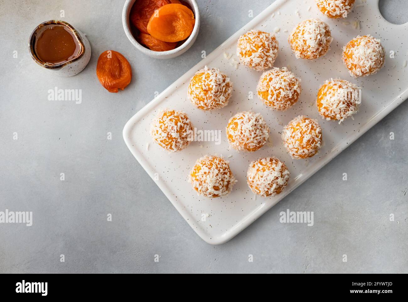 raw vegan energy balls with dried apricots and coconut Stock Photo Alamy